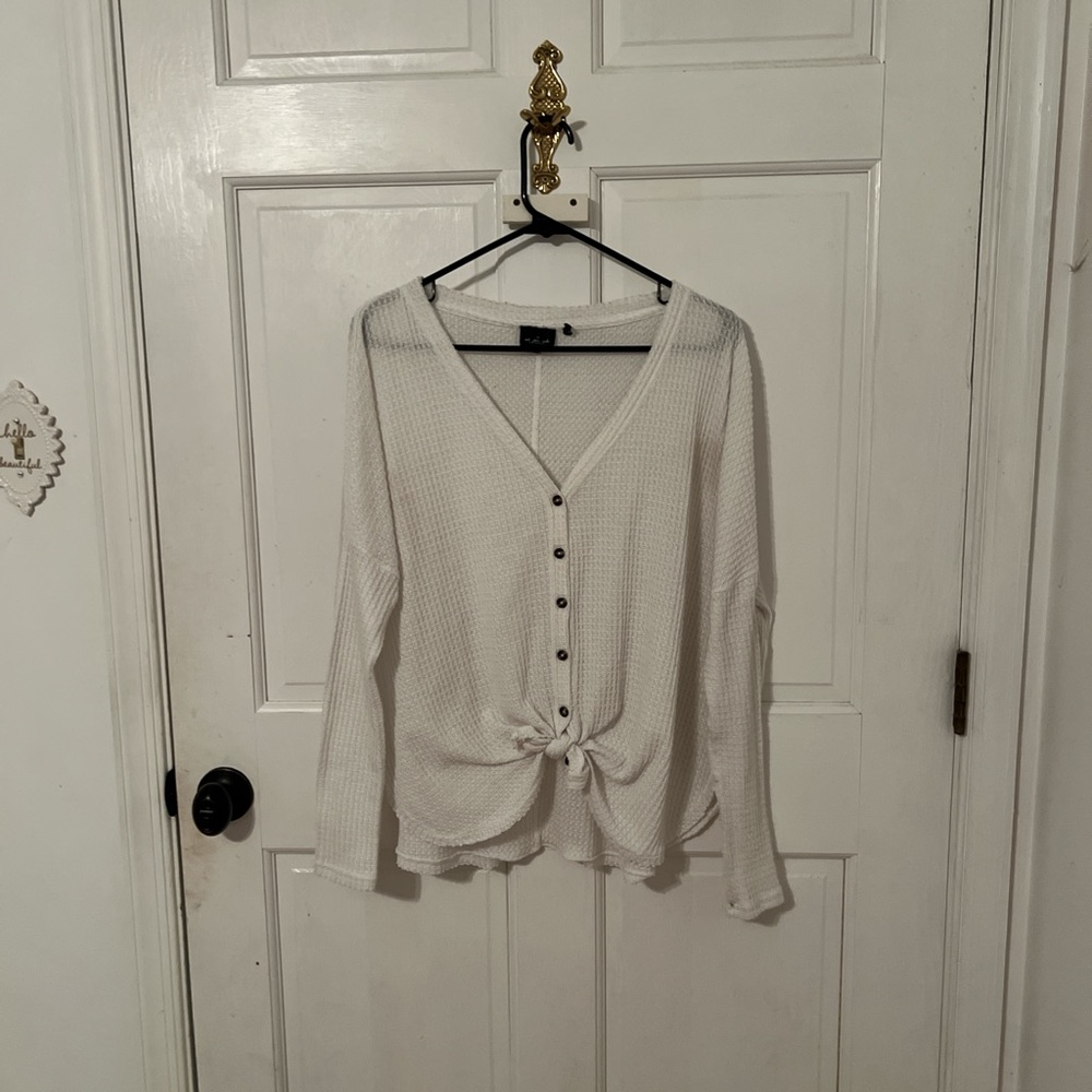 Out from Under (UO) JoJowhite knit top with button and tie details 🤍
